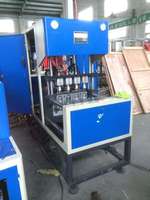 Machine de soufflage de bouteilles en PET semi-automatique, équipement de moulage par soufflage de bouteilles d'eau en plastique pour la production de bouteilles en PET