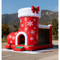 Château gonflable de Noël personnalisable avec toboggan pour fêtes et locations d'attractions en centre commercial