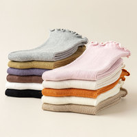 Chaussettes empilées mi-tube en coton confortables pour le printemps et l'automne Chaussettes filetées à bord en bois doux