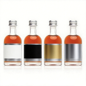 Mini botella de vidrio transparente de 50 ml y 100 mL adecuada para almacenar Gin Whisky y Vodka - Product Image 4