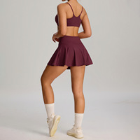Ensemble de jupe de tennis pour femmes en stock du fabricant, vêtements de sport de badminton en plein air, ensemble deux pièces avec poches pour la protection de la modestie