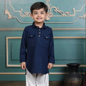 young <b>boy</b> wearing navy blue <b>kurta</b> traditional outfit with wooden buttons stylish ethnic clothing detail portrait - Product Image 1