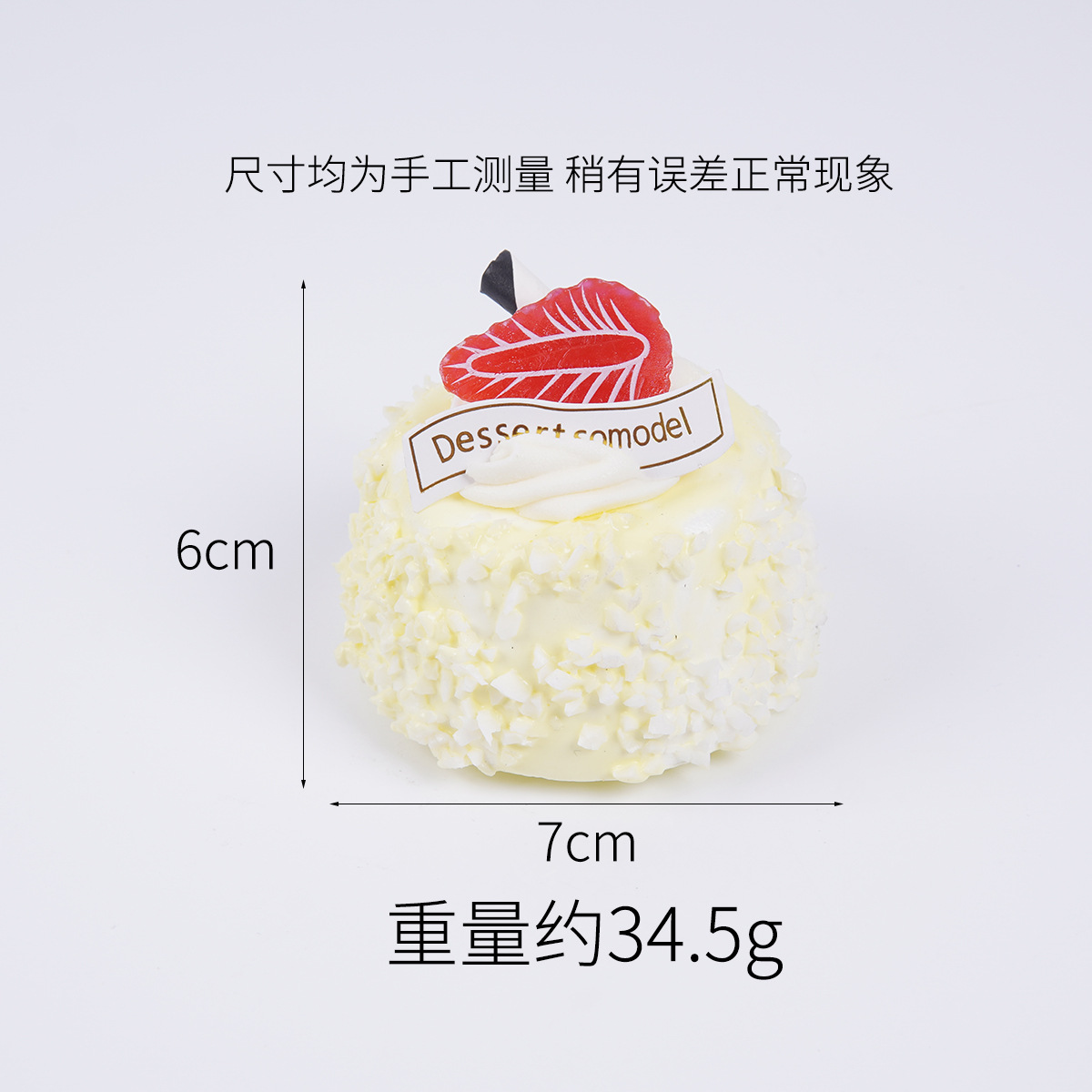 Imán de nevera con forma de pastel blanco.