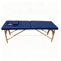 Table de massage pliante en bois massif, confortable et portable, avec revêtement en PU, pour acupuncture, vente en gros, nouveau design