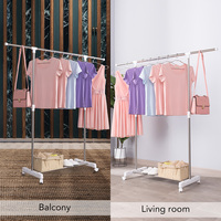 Vente en gros en usine Séchoir à vêtements pliable moderne en métal pour chevaux à bas prix Organisateur de balcon 2 ailes à double niveau pour garde-robe