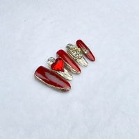 Uñas artificiales hechas a mano puras Forma de uña ovalada larga estilo festivo rojo Alta calidad y reutilizable