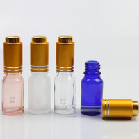 Bouteilles compte-gouttes en verre de luxe avec bouton-poussoir pour huiles essentielles, sérums et parfums – Vente en gros – 30 ml, 50 ml, 100 ml