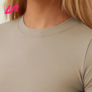 OEM/ODM-ropa de gimnasio personalizada para mujer, camisetas ajustadas de entrenamiento de alta calidad, Tops lisos de nailon con cuello redondo, venta al por mayor