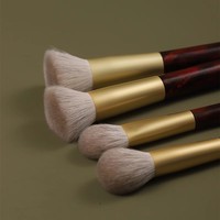 Pinceau de maquillage en poils de chèvre de luxe de haute qualité Grand manche en ébène laqué Poudre libre Blush Logo personnalisé
