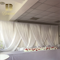 Rideaux croisés de couleur populaire rideau de scène de toile de fond de mur de mariage à Double couche avec cadre de support pour les décorations de fête d'événement