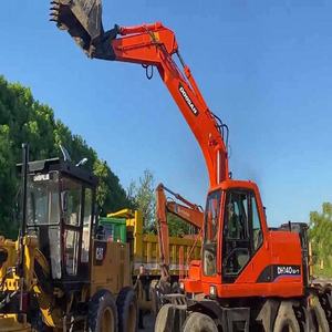 รถขุดไฮดรอลิกแบบล้อ Doosan DH140W-7 ปรับสภาพใหม่ เครื่องยนต์เดิม บุ้งกี๋ 0.8 ลูกบาศก์เมตร กำลัง 73.8 กิโลวัตต์ รับประกัน 6 เดือน คุณภาพสูง - Product Image 4