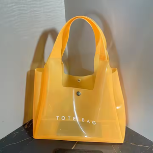 Elegante bolso de mano de PVC naranja con cierre de botón, logotipo personalizado y diseño de gelatina transparente, bolso de moda para compras de regalos - Product Image 1