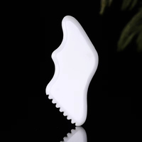 Rouleau de massage facial et corporel en jade et métal ODM OEM avec peigne absorbant l'huile pour les soins des yeux
