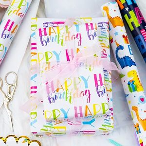 Papel de regalo de papel estucado con diseño de dinosaurios coloridos y lindos para cumpleaños infantiles - Product Image 1