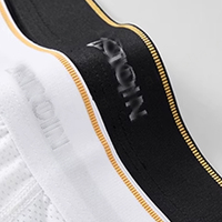 Venta al por mayor de calzoncillos de hombre con logotipo personalizado y bolsa de pelota bóxer de gimnasio calzoncillos de malla sólida transpirable de secado rápido para hombres ropa interior bóxer deportiva