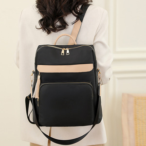กระเป๋าเป้สะพายหลัง PU น้ำหนักเบาความจุขนาดใหญ่ของผู้หญิง สไตล์เกาหลีใหม่ ดีไซน์เรียบง่ายทันสมัยสำหรับการเดินทางพร้อมหูหิ้วคู่ - Product Image 4