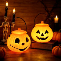 Promotion : Seau lumineux en forme de citrouille souriante pour l'intérieur, idéal pour la collecte de bonbons ou comme panier de déguisement, parfait pour les fêtes et les jeux.