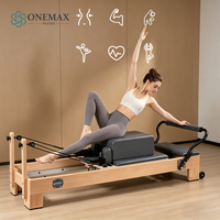 Machine de Pilates Reformer Onemax de qualité commerciale en bois massif, haute résistance, pour studio