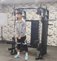 Machine de musculation multifonctionnelle tout-en-un pour livraison rapide : rack de musculation, crossover, squat, dips, machine Smith