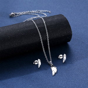 Vente chaude Été En Acier Inoxydable <span class=keywords><strong>Plume</strong></span> <span class=keywords><strong>Collier</strong></span> et Boucles D'oreilles Ensemble <span class=keywords><strong>Pas</strong></span> <span class=keywords><strong>Cher</strong></span> Nouveaux Bijoux avec Chaîne À Maillons En Gros - Product Image 2