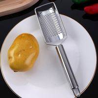 Handmatige roestvrijstalen multifunctionele groenteschiller, -snijder en -mes voor aardappelen, uien, radijzen, komkommers, keukengereedschap
