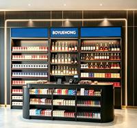 Étagère de présentation de tabac et de vin pour magasin de proximité avec comptoir-caisse