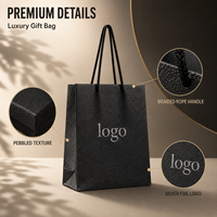 Sac cadeau en papier texturé noir de luxe personnalisé avec poignées en corde pour bijoux, parfums, chaussures et emballages de vente au détail pour boutiques