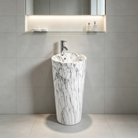 Lavabo sur pied moderne à motif marbre blanc, gris, noir pour salle de bain d'hôtel