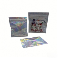 Petits sacs d'emballage refermables en mylar holographique réutilisables et recyclables avec un design transparent d'un côté