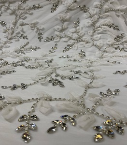 Tissu en dentelle à mailles avec des perles et des paillettes brodées à la main de haute qualité pour robe de mariée - Product Image 1
