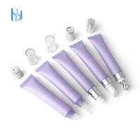 Tube de compression en plastique souple avec logo personnalisé en stock de haute qualité 20g rose/vert/noir/blanc/violet tube de brillant à lèvres