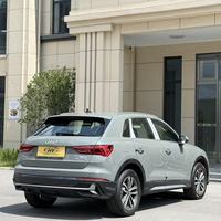 Audi Q3 d'occasion grise 2024 de luxe compacte haut de gamme, SUV turbo, 129 km, faible kilométrage, automatique, conduite à gauche, intérieur cuir foncé, vente en gros