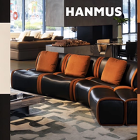 Canapé modulaire en forme de U de style mid-century vintage en cuir noir à bords orange, conçu par un designer nordique