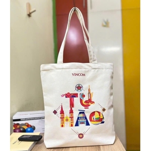 กระเป๋าผ้าแคนวาสสีขาวพิมพ์ลายซิลค์สกรีนแบบรีไซเคิล ขนาดกลาง เป็นมิตรกับสิ่งแวดล้อม สำหรับโปรโมชั่น ออกแบบเองได้ ขายส่งจำนวนมาก - Product Image 2