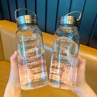 Bouteille d'eau en verre surdimensionnée résistante à la chaleur avec bouchon à paille anti-fuite sans BPA, style minimaliste de luxe pour la maison, le bureau et le sport