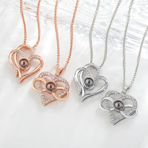 Simbolo di moda 8 Infinity <span class=keywords><strong>ti</strong></span> <span class=keywords><strong>amo</strong></span> In 100 lingue placcato oro rosa Bowknot cuore di proiezione collana pendente da donna - Product Image 1