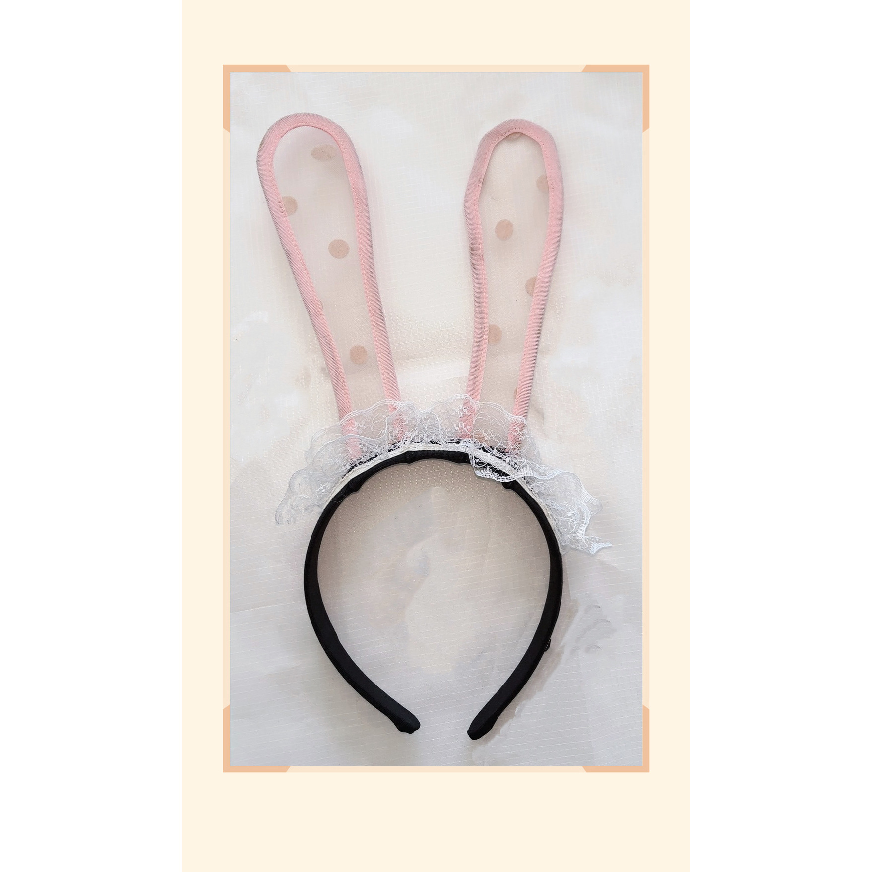 Oreilles de lapin en dentelle à pois roses