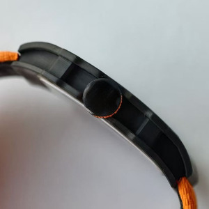 Montre de sport pour homme en fibre de carbone TPT de haute qualité, luxueuse et élégante, étanche et antichoc, avec cadran saphir ajouré orange. - Product Image 3