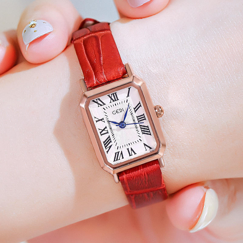 Rose gold shell, white plate, red band