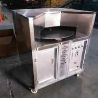 Four rotatif automatique à gaz pour pain arabe Four à disque rotatif pour pain arabe Four à gaz électrique pour pain arabe d'extérieur Four à pain roti pita