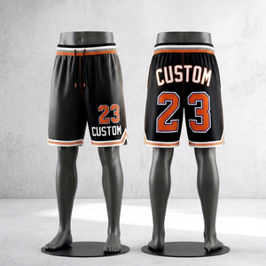 Shorts de basketball personnalisés noir et orange en maille respirante, sublimés, pour l'entraînement sportif en équipe, vente en gros et approvisionnement en vrac - Product Image 1