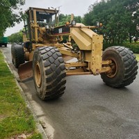 Niveleuses Caterpillar 16H d'occasion du Japon Niveleuse RCM 140G 140H avec pompe Cummins Engine PLC et boîte de vitesses à vendre