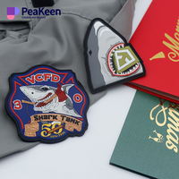 PeaKeen personnalisé gaufré à repasser sur caoutchouc souple PVC étiquette de vêtement patch en caoutchouc vêtements vêtements caoutchouc Logo 3D Silicone PVC Logo