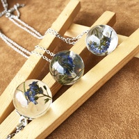 Bijoux fleur bleue résine époxy vraie séchée pressée forget me not collier commémoratif