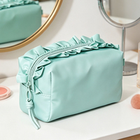 Sac de maquillage personnalisé à volants et fermeture éclair, écologique, vente en gros, sac cosmétique portable pour l'extérieur