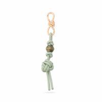 Porte-clés moderne en corde tressée avec perles, nœud irrégulier, double boucle de verrouillage, breloques de sac en cuir faites à la main pour femmes