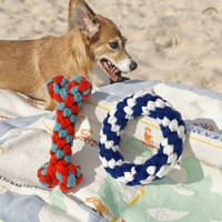 Vente en gros de fournitures pour animaux de compagnie Jouets à mâcher en coton pour chiens, chiots, anneaux en os tressés durables, jouets sûrs et agréables pour chiens