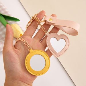 Mini Espejo Creativo en Forma de Corazón, Espejo Redondo con Diseño Floral, Llavero de Cuero PU Antipérdida, Espejo de Maquillaje para Accesorios de Bolsa - Product Image 4