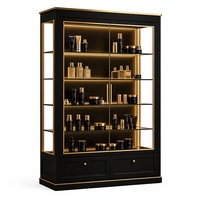 Vitrine de présentation de luxe noire et or avec éclairage LED et étagères en verre pour cosmétiques, idéale pour les boutiques de détail