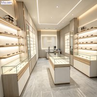 Meuble de présentation pour opticien Maxsen en bois clair, vitrine murale LED pour lunettes, verre trempé, finition couleur personnalisable, comptoir